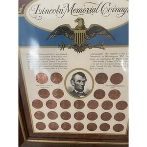 Lincoln Memorial Coinage, 29 pennies in framed 10 by 12 wood frame. A17